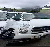 IMAX Private Transfer 7 Guests Cairns Airport to Hotels in Cairns City - Tourism Brisbane