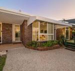 Woorim Secluded Palms Cottage - Brisbane Tourism