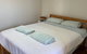 One Bedroom CBD Unit, Walk To Beaches & Cafes - thumb 1