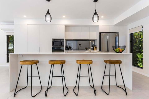 Raphari At The Cove - A Stunning Poolside Escape - Tourism Brisbane 3