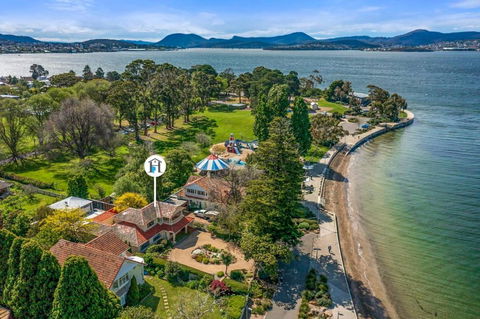 Waterfront Escape - A Family Oasis On Long Beach - Tourism Brisbane 0